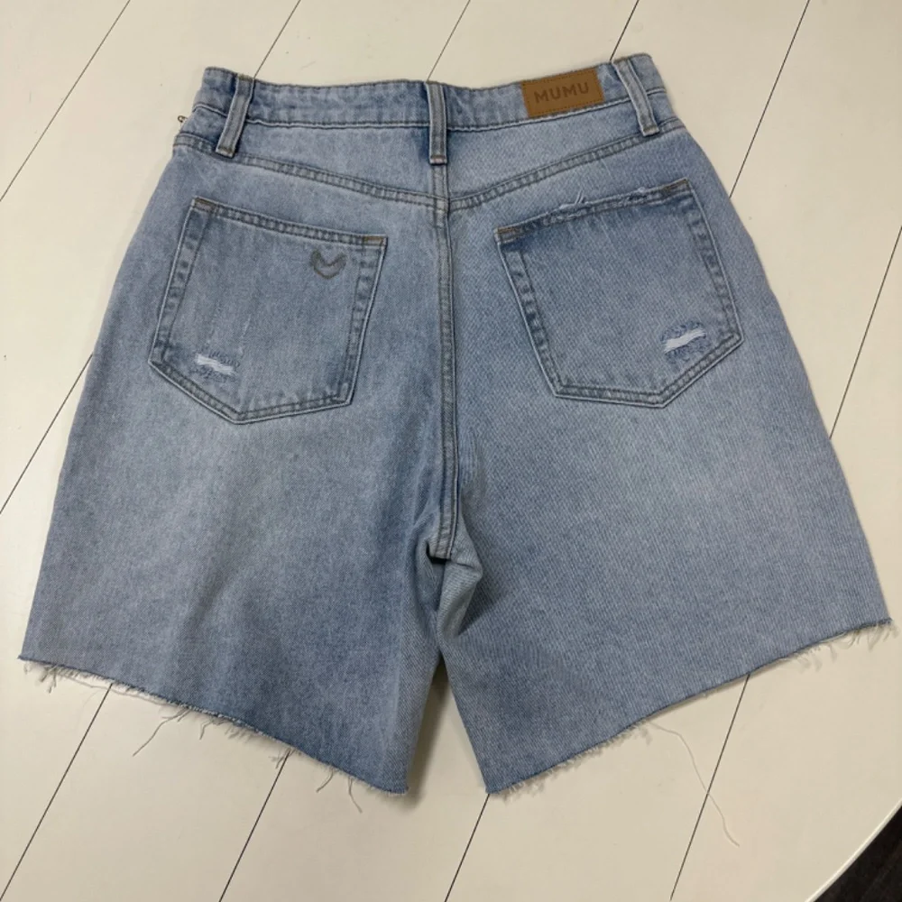 Long Denim distressed Denim shorts